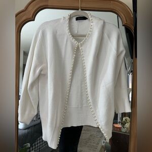 Pearl lined blazer.